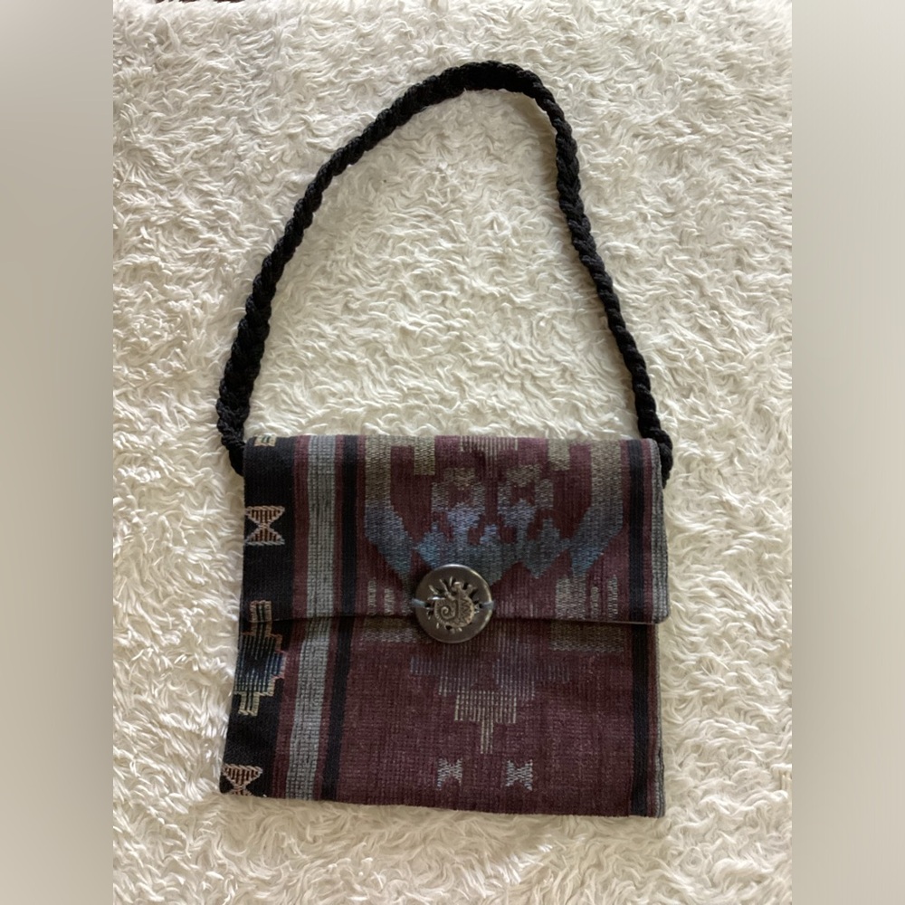Handmade aztec shoulder bag with braided handle and handmade stone closure
